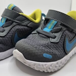 Nike Kids Gray and Blue Sneakers with Yellow Lining